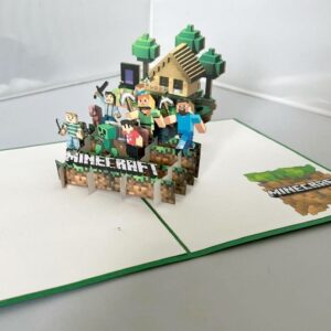 Minecraft 3D Pop Up Card featuring Steve, Minecraft characters, animals, trees and a pixel-style house – handmade birthday gift and greeting card for Minecraft fans and gamers.